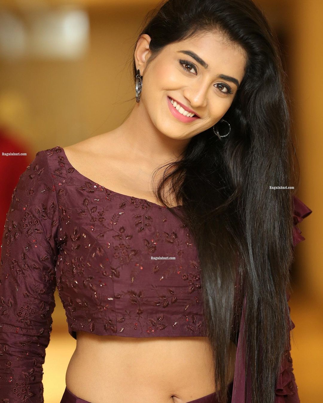 TOLLYWOOD ACTRESS RASHI SINGH STILLS IN MAROON LEHENGA CHOLI 7